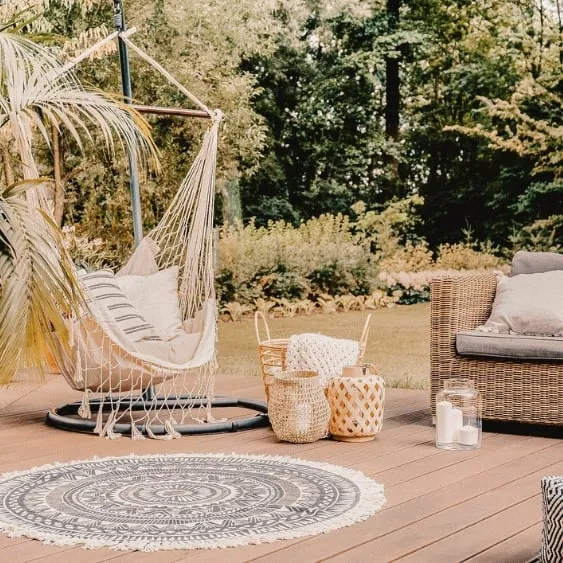 Cozy outdoor deck with stylish decorative accessories.