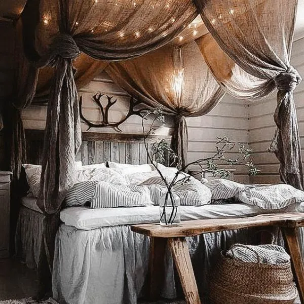 Rustic Canopy Bedroom with Warm Lighting and Natural Decor