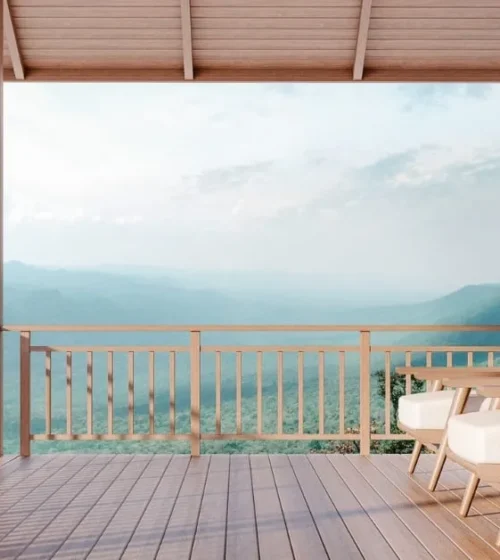 Wooden deck with comfortable seating and stunning mountain views.