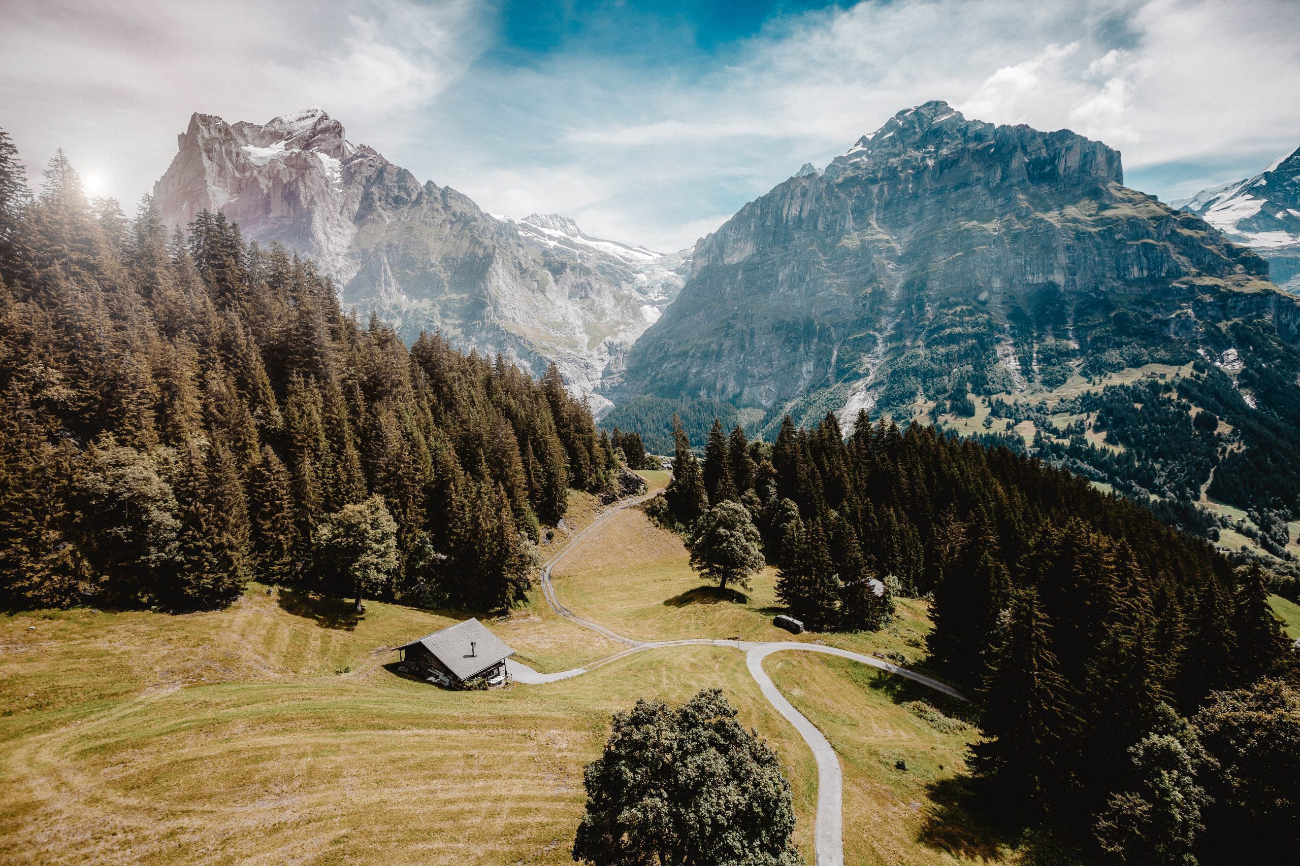 You can see a cabin in the mountains