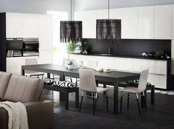 You can see a dining room with black accents.