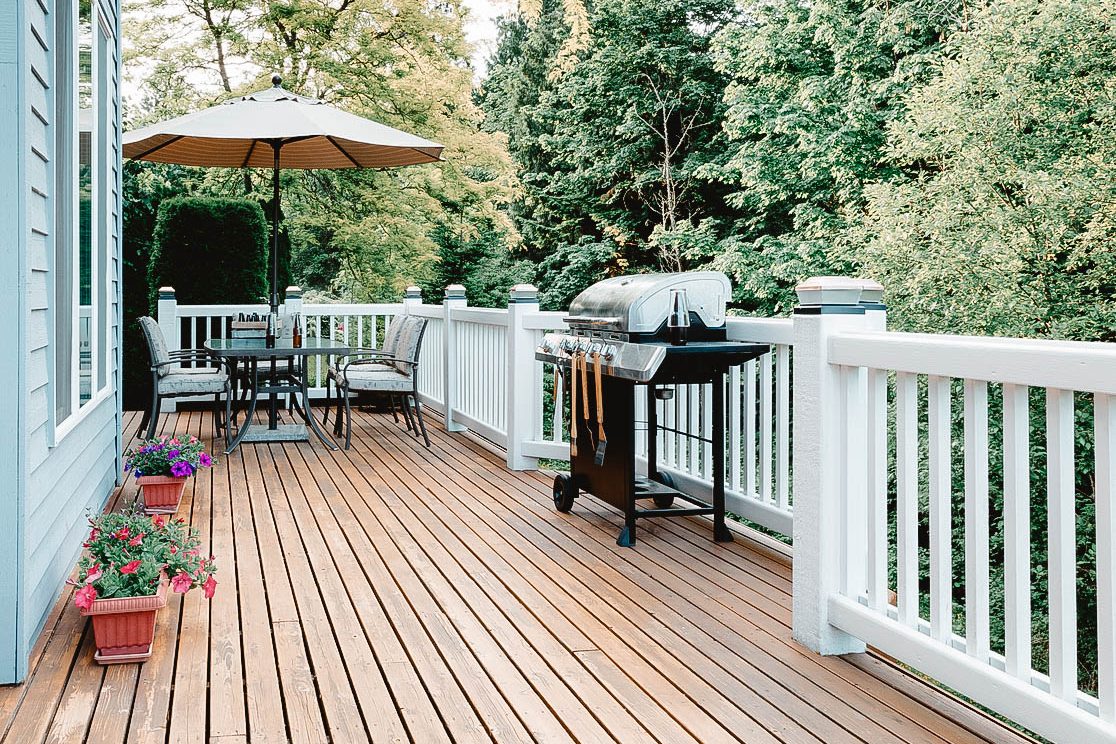 ** DO NOT DELETE ** Clean outdoor cedar wooden deck and patio of home with BBQ cooker and bottled beer