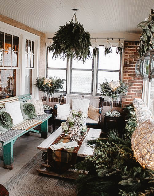 You can see a sunroom decorated for the holidays.