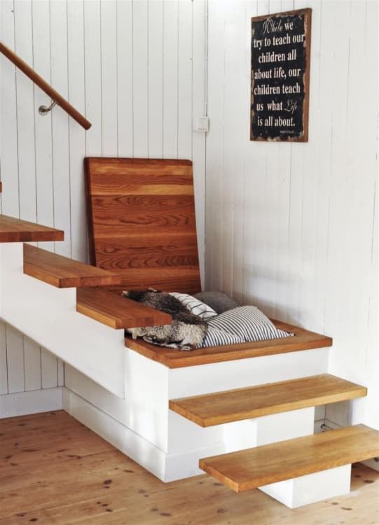 You see storage space under the stairs of a tiny house