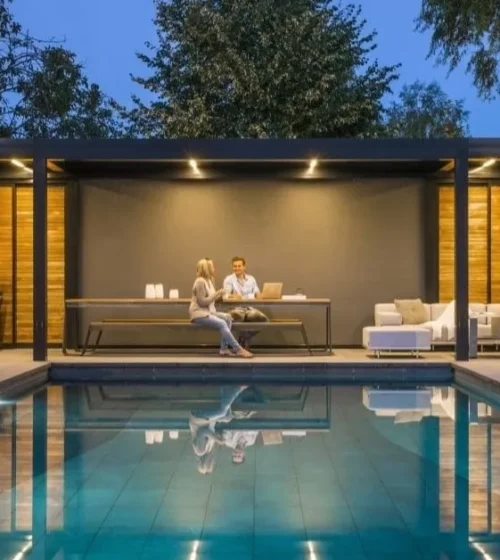 Modern pool house with sleek design, supported by screw pile foundations, offering both durability and cost-efficiency.