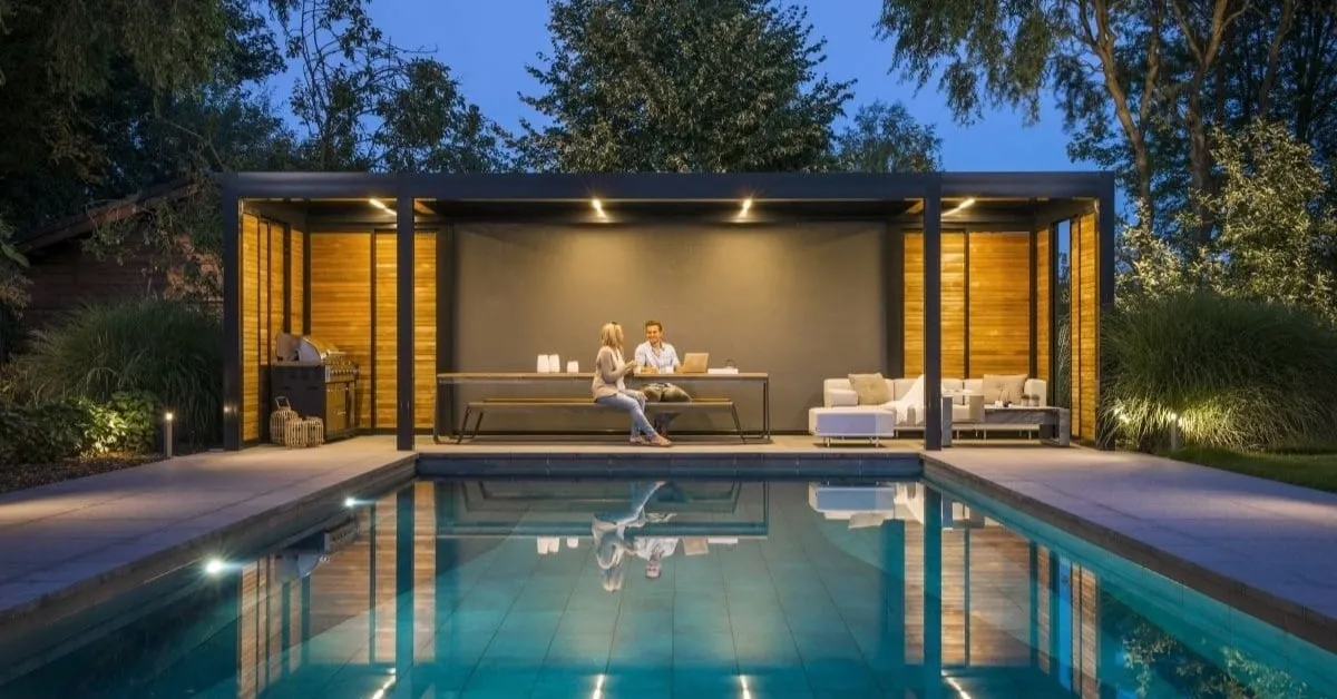 Modern pool house with sleek design, supported by screw pile foundations, offering both durability and cost-efficiency.